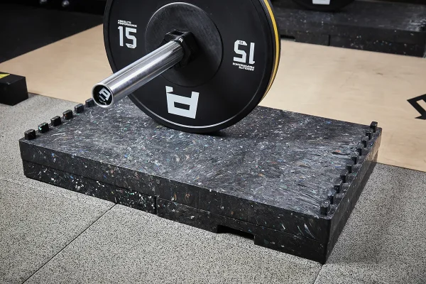 A bar on top of the DC Blocks Double Wide weightlifting blocks